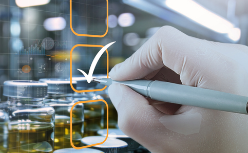 Gloved hand checking off boxes in vial lab icon